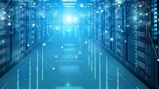 Blue-lit data centre corridor with rows of server racks and digital network overlay on a reflective floor
